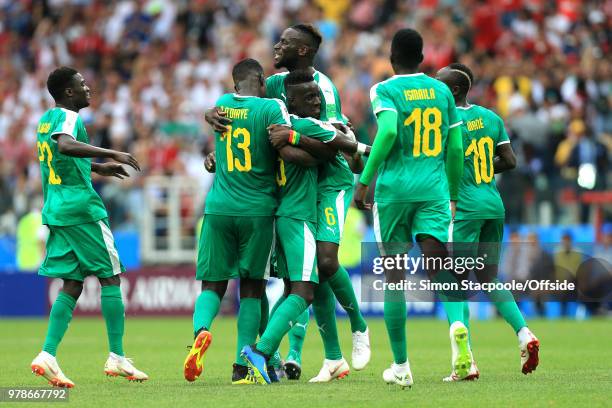 Senegal celebrate their opening goal during the 2018 FIFA World Cup Russia group H match between Poland and Senegal at Spartak Stadium on June 19,...