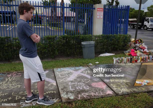 Fans and mourners of Broward-based rapper XXXTentacion, whose given name was Jahseh Onfroy, visit the shooting scene on Tuesday, June 19 outside Riva...