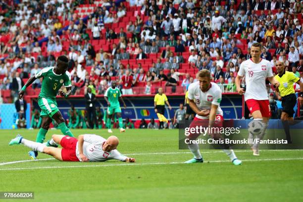 Idrissa Gueye of Senegal takes a shot that leads to his sides first goal during the 2018 FIFA World Cup Russia group H match between Poland and...