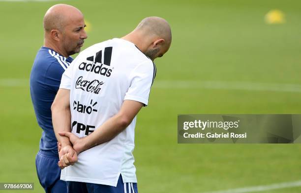 Jorge Sampaoli coach of Argentina and Javier Mascherano of Argentina talk during a training session at Stadium of Syroyezhkin sports school on June...