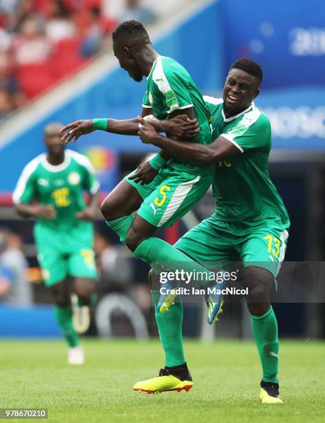 Idrissa Gueye and Alfred N'Diaye of Senegal celebrates their sides first goal during the 2018 FIFA World Cup Russia group H match between Poland and...