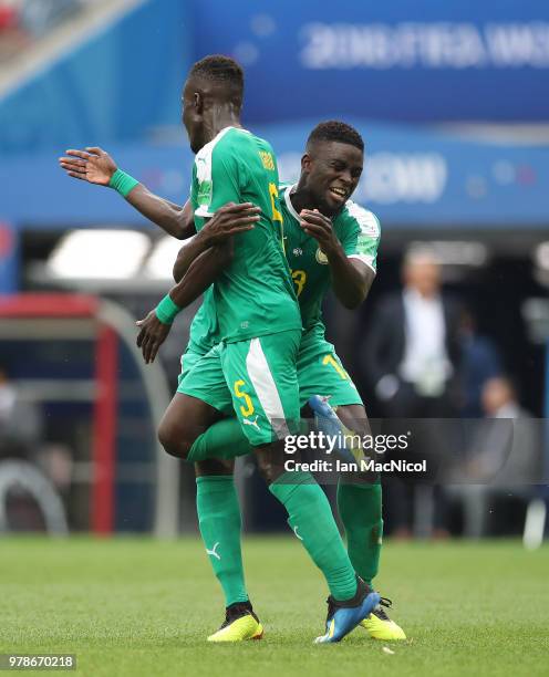 Idrissa Gueye and Alfred N'Diaye of Senegal celebrates their sides first goal during the 2018 FIFA World Cup Russia group H match between Poland and...