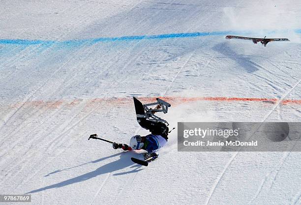 Tyler Walker of USA crashes as he competes in the Men's Sitting Super-G during Day 8 of the 2010 Vancouver Winter Paralympics at Whistler Creekside...