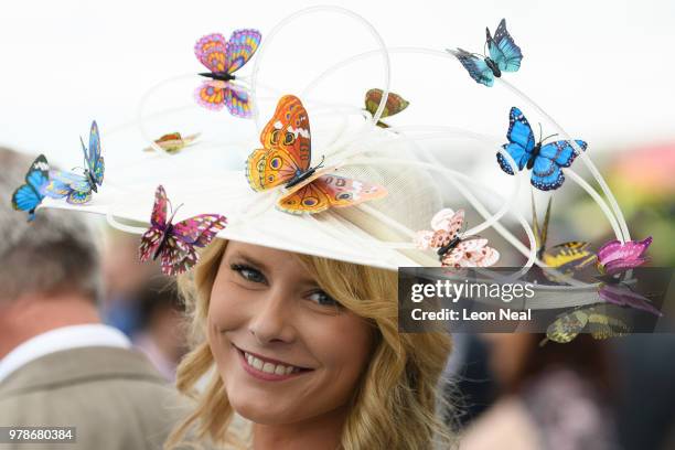 Woman wears a hat decorated with butterflies during day one of Royal Ascot at Ascot Racecourse on June 19, 2018 in Ascot, United Kingdom. Royal Ascot...