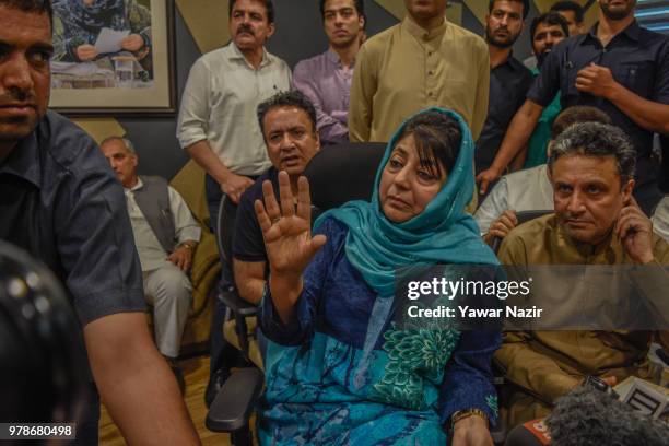 Mehbooba Mufti, patron of the People's Democratic Party , and her cabinet addresses media persons after the ruling Bharatiya Janata Party ended its...