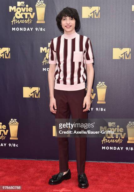 Actor Finn Wolfhard attends the 2018 MTV Movie And TV Awards at Barker Hangar on June 16, 2018 in Santa Monica, California.