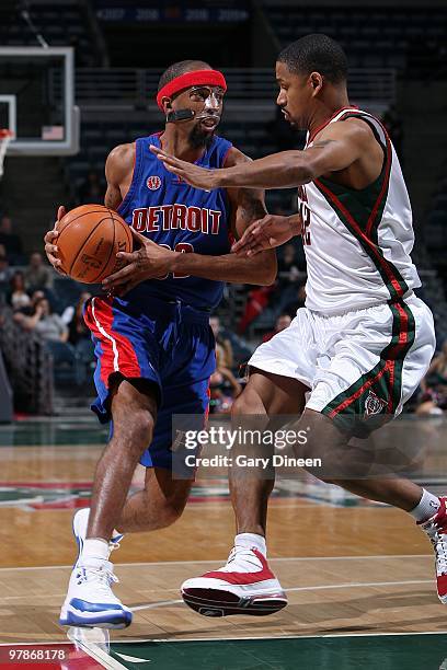 Richard Hamilton of the Detroit Pistons handles the ball against Charlie Bell of the Milwaukee Bucks during the game on February 9, 2010 at the...