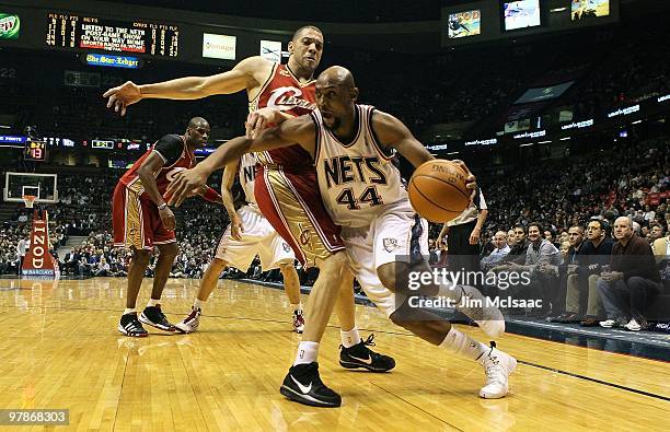 Trenton Hassell of the New Jersey Nets drives to the hoop against the Cleveland Cavaliers at the Izod Center on March 3, 2010 in East Rutherford, New...