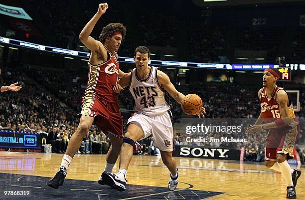 Kris Humphries of the New Jersey Nets controls the ball against the Cleveland Cavaliers at the Izod Center on March 3, 2010 in East Rutherford, New...