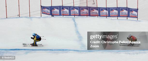 Anna Holmlund of Sweden takes 1st place, Ophelie David of France takes 2nd place during the FIS Freestyle World Cup Women's Ski Cross on March 20,...