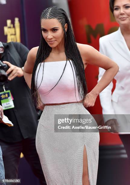 Personality Kim Kardashian attends the 2018 MTV Movie And TV Awards at Barker Hangar on June 16, 2018 in Santa Monica, California.