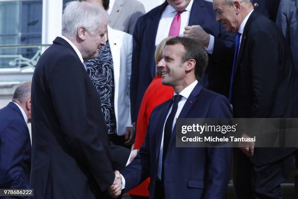 French President Emmanuel Macron greets Interior Minister, Horst Seehofer ahead of a family photo with the ministers of german and French cabinet at...