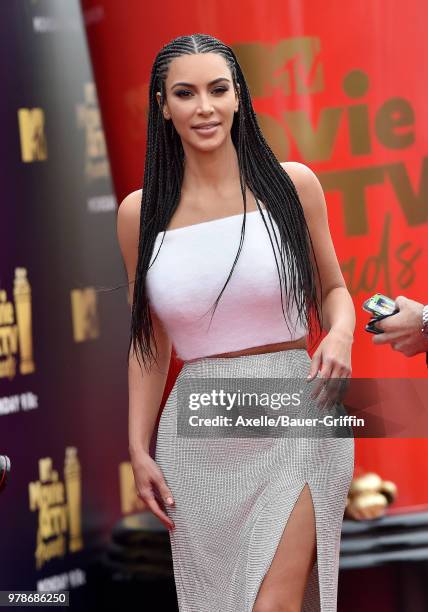 Personality Kim Kardashian attends the 2018 MTV Movie And TV Awards at Barker Hangar on June 16, 2018 in Santa Monica, California.