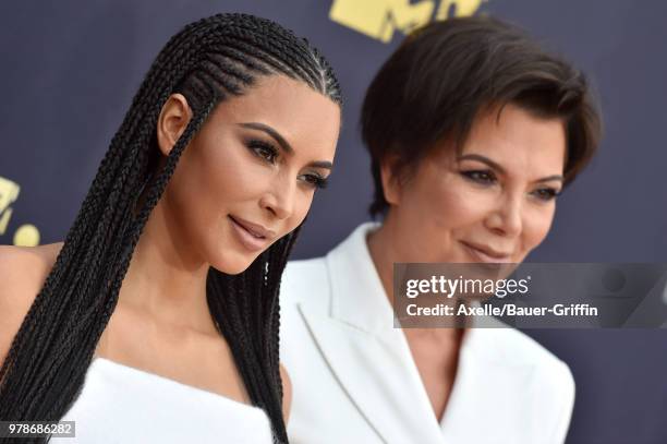 Personalities Kim Kardashian and Kris Jenner attend the 2018 MTV Movie And TV Awards at Barker Hangar on June 16, 2018 in Santa Monica, California.