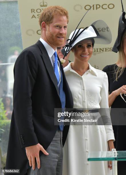 Prince Harry, Duke of Sussex and Meghan, Duchess of Sussex as they present the winners cup to breeder John Gunther after his horse Without Parole...