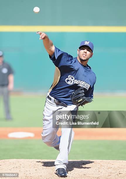 Carlos Villanueva of the Milwaukee Brewers pitches during a Spring Training game against the Cincinnati Reds on March 11, 2010 at Goodyear Ballpark...