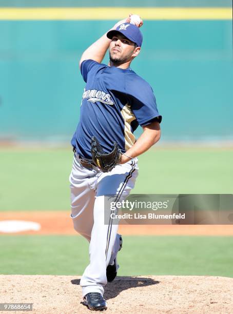 Carlos Villanueva of the Milwaukee Brewers pitches during a Spring Training game against the Cincinnati Reds on March 11, 2010 at Goodyear Ballpark...