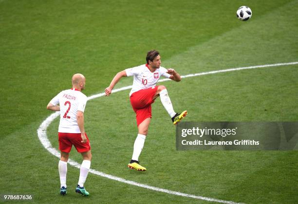 Grzegorz Krychowiak of Poland makes a pass that will end in a Mbaye Niang of Senegal goa;l to make it 2-0 during the 2018 FIFA World Cup Russia group...
