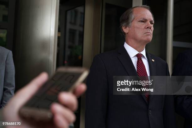 Former Senate Intelligence Committee Security Director James Wolfe comes out from the U.S. District Courthouse after a status hearing June 19, 2018...