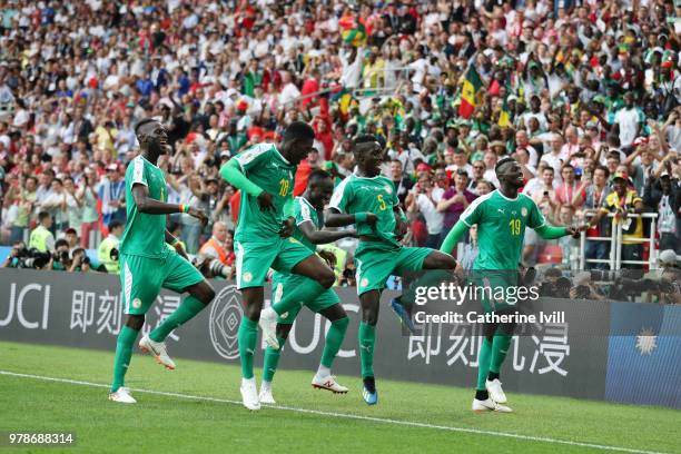 Mbaye Niang of Senegal celebrates with teammates after scoring his team's second goal during the 2018 FIFA World Cup Russia group H match between...