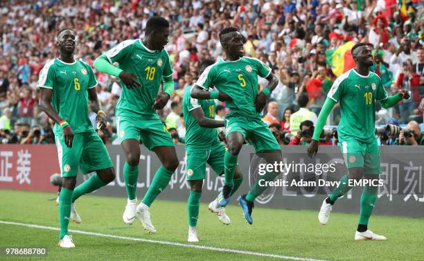 Senegal's M'Baye Niang celebrates scoring his side's second goal of the game with team-mates Idrissa Gueye , Ismaila Sarr and Salif Sane Poland v...