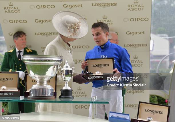 Princess Anne, Princess Royal presents William Buick with the King's Stand Stakes Cup on day 1 of Royal Ascot at Ascot Racecourse on June 19, 2018 in...