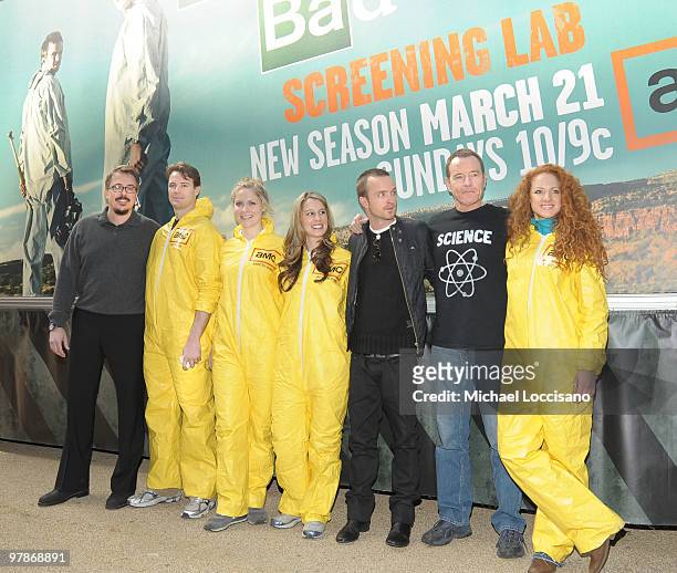 Writer/producer/director Vince Gilligan, and actors Aaron Paul Bryan Cranston pose with "Breaking Bad" Haz Mat volunteers for the "Breaking Bad"...