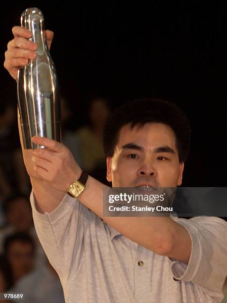 Hsieh Yu Ping of Chinese Taipei lifts the Asian Bowling Tour Trophy aloft after he won the Tour on the 2nd of April during the CGU Asian Bowling...