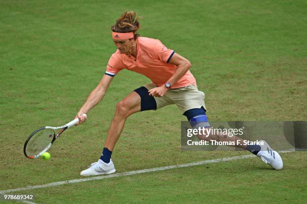 Alexander Zverev of Germany plays a forehand in his match against Borna Coric of Croatia during day two of the Gerry Weber Open at Gerry Weber...