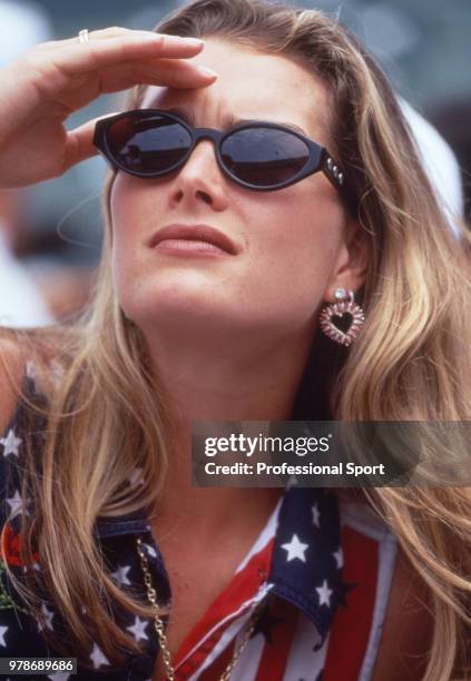 Brooke Shields, model and girlfriend of Andre Agassi , watches from the crowd as Agassi plays in the Men's Singles Gold Medal match during the tennis...