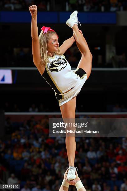Cheerleader for the Missouri Tigers performs during the first round of the 2010 NCAA men's basketball tournament at HSBC Arena on March 19, 2010 in...