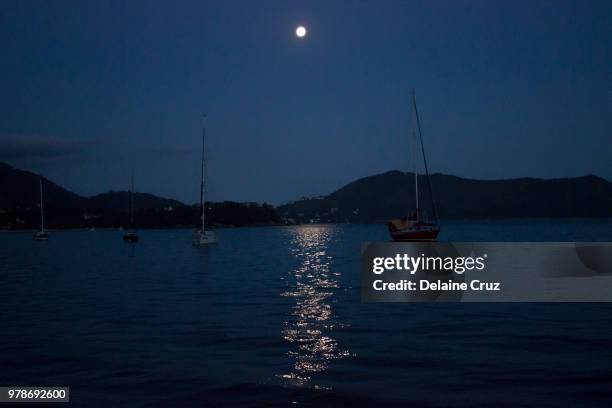 moon in the marina - ubatuba - ubatuba stock pictures, royalty-free photos & images