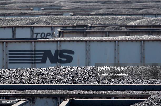 Norfolk Southern Corp. Rail cars filled with coal sit in the holding yard of the Lamberts Point coal transloading facility in Norfolk, Virginia,...
