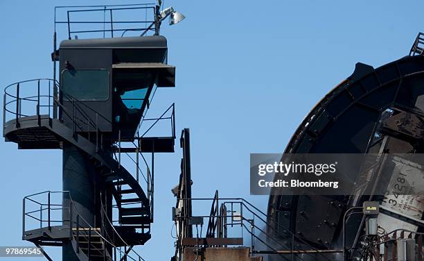 An operator unloads coal from a rail with a rotary dumper at the Norfolk Southern Lamberts Point coal transloading facility in Norfolk, Virginia,...