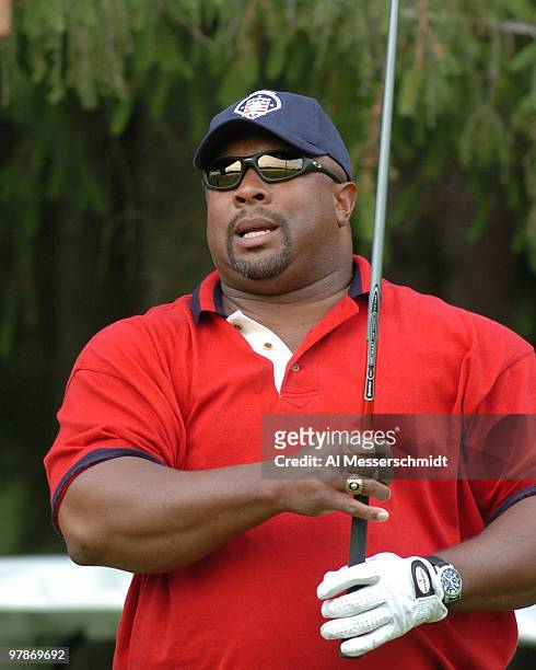 Kirby Puckett talks to the media before teeing off in the Baseball Hall of Fame Members Golf Tournament July 24, 2004 in Cooperstown, New York.