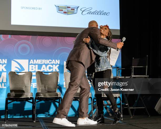 Dondre Whitfield and Imani Hakim on stage during the American Black Film Festival - Celebrity Scene Stealers Presented By TV One at Loews Miami Beach...