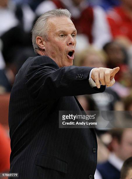 Bo Ryan head coach of the Wisconsin Badgers shouts instructions from the sideline against the Wofford Terriers during the first round of the 2010...