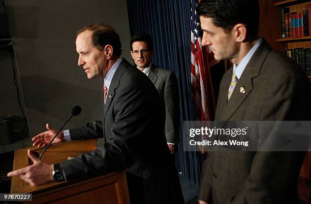 Rep. Dave Camp speaks as House Minority Whip Rep. Eric Cantor and Rep. Paul Ryan listen during a news conference on the health care legislation March...