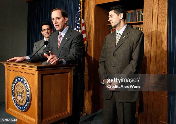 Rep. Dave Camp speaks as House Minority Whip Rep. Eric Cantor and Rep. Paul Ryan listen during a news conference on the health care legislation March...