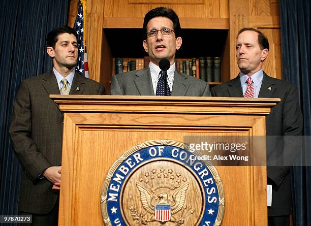House Minority Whip Rep. Eric Cantor speaks as Rep. Dave Camp and Rep. Paul Ryan listen during a news conference on the health care legislation March...