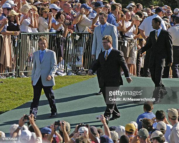 Ryder Cup captains Hal Sutton and Bernhard Langer parade to the stage during opening ceremonies at the 2004 Ryder Cup in Detroit, Michigan, September...