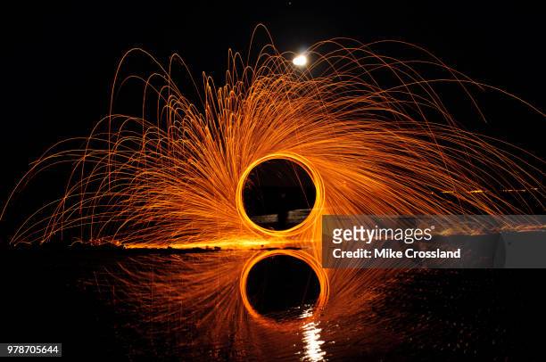beach fire - scouring pad stock pictures, royalty-free photos & images