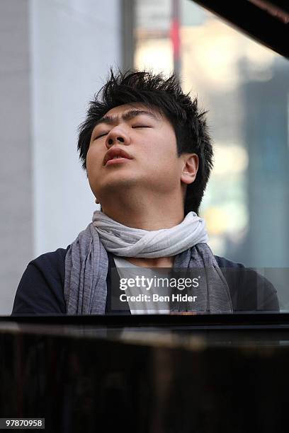 Pianist Lang Lang performs at the Apple Store - Upper West Side on March 19, 2010 in New York City.