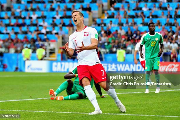 Arkadiusz Milik of Poland reacts after missing a chance during the 2018 FIFA World Cup Russia group H match between Poland and Senegal at Spartak...