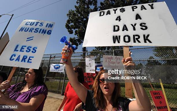 Members of the California Association of Psychiatric Technicians and their supporters protest outside Metropolitan State Hospital in Norwalk,...