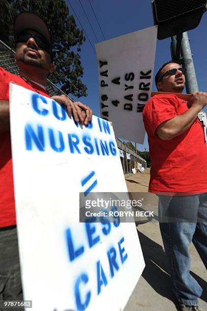 Brothers Ruben and Eric Soto, both pyschiatric nurses, protest with members of the California Association of Psychiatric Technicians and their...