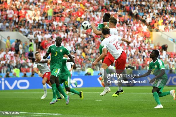 Grzegorz Krychowiak of Poland scores the first Poland goal during the 2018 FIFA World Cup Russia group H match between Poland and Senegal at Spartak...