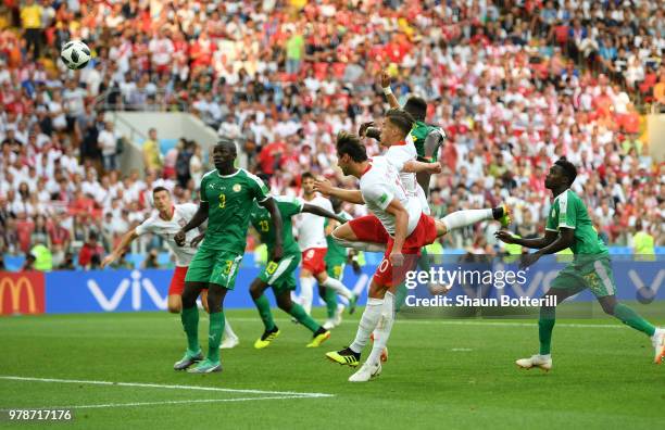 Grzegorz Krychowiak of Poland scores the first Poland goal during the 2018 FIFA World Cup Russia group H match between Poland and Senegal at Spartak...