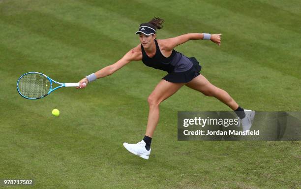 Garbine Muguruza of Spain reaches for a forehand during her first round match against Anastasia Pavlyuchenkova of Russia on Day Four of the Nature...
