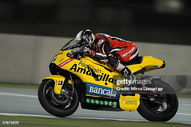 BHector Barbera of Spain and Team Aspar heads down a straight during the third day of testing at Losail Circuit on March 19, 2010 in Doha, Qatar.